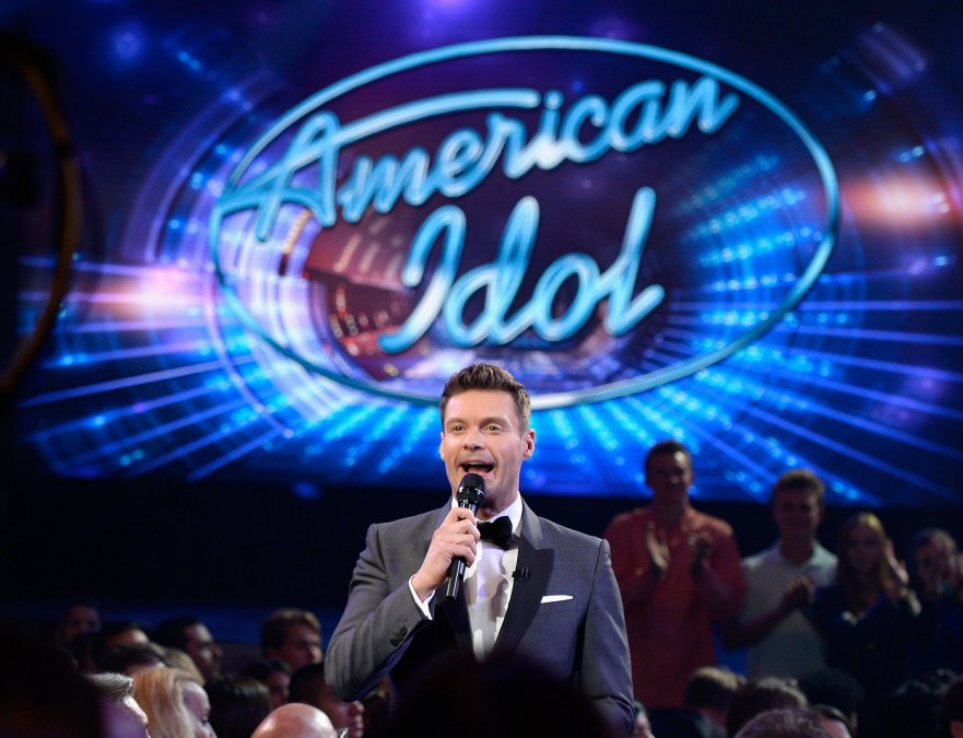 Host Ryan Seacrest speaks in the audience