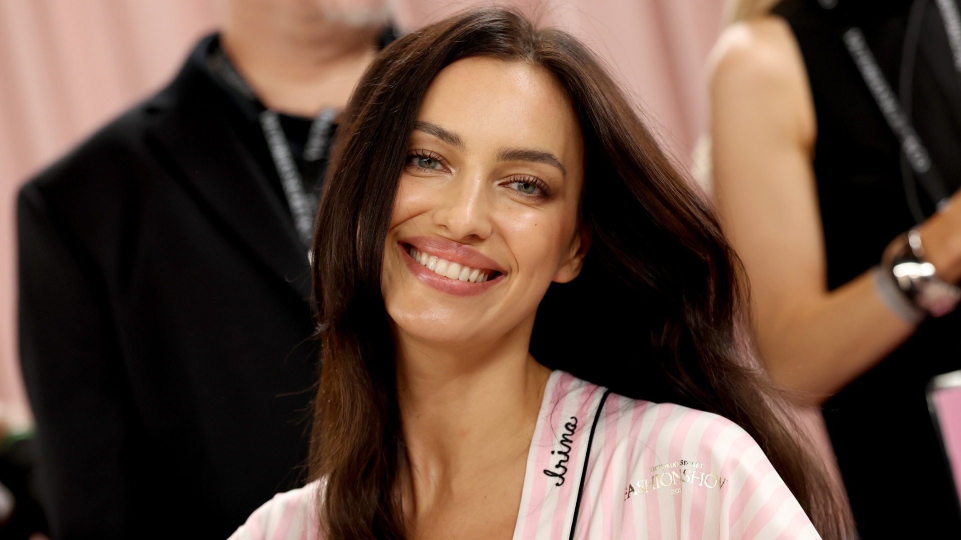 Irina Shayk smiling backstage at VS show