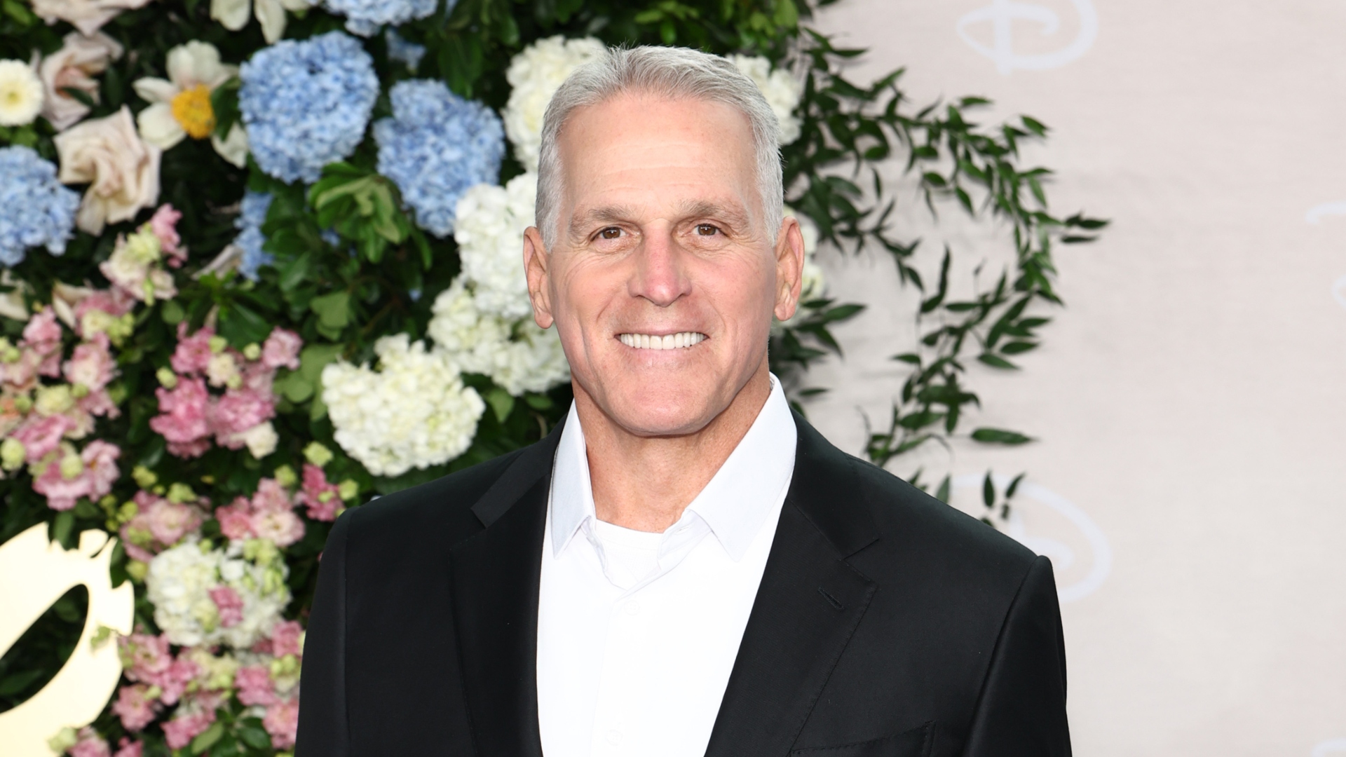 Mel Owens smiling at an event