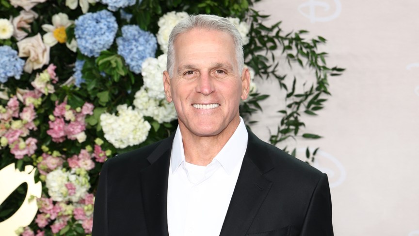 Mel Owens smiling at an event