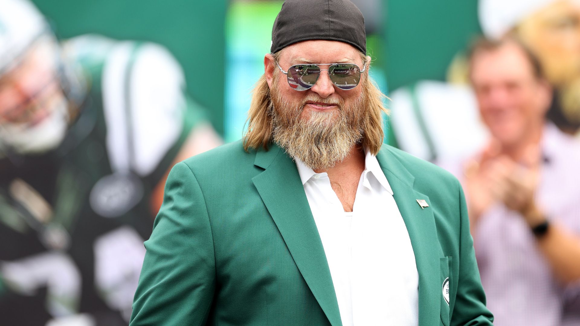 Former New York Jets player Nick Mangold looks on as he is inducted into the Jets Ring of Honor during halftime of the game against the Cincinnati Bengals at MetLife Stadium on September 25, 2022 in East Rutherford, New Jersey
