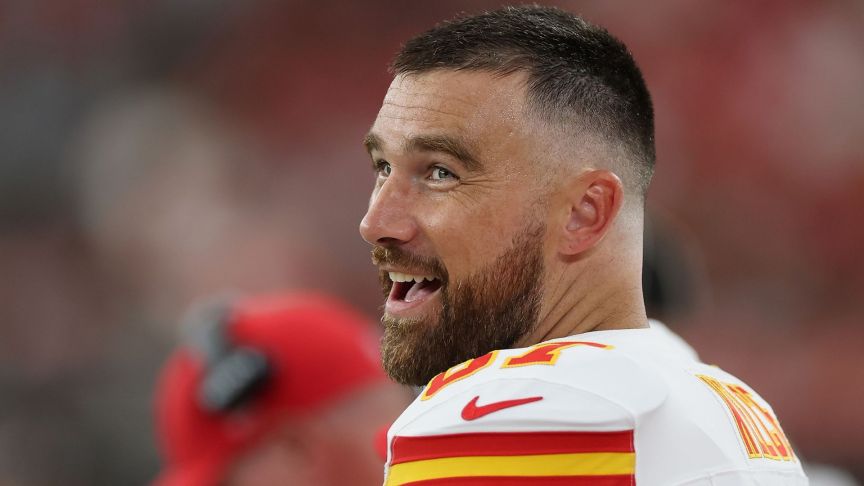 Tight end Travis Kelce #87 of the Kansas City Chiefs reacts on the sidelines during the first quarter of the NFL Preseason 2025 game against the Arizona Cardinals at State Farm Stadium on August 09, 2025 in Glendale, Arizona