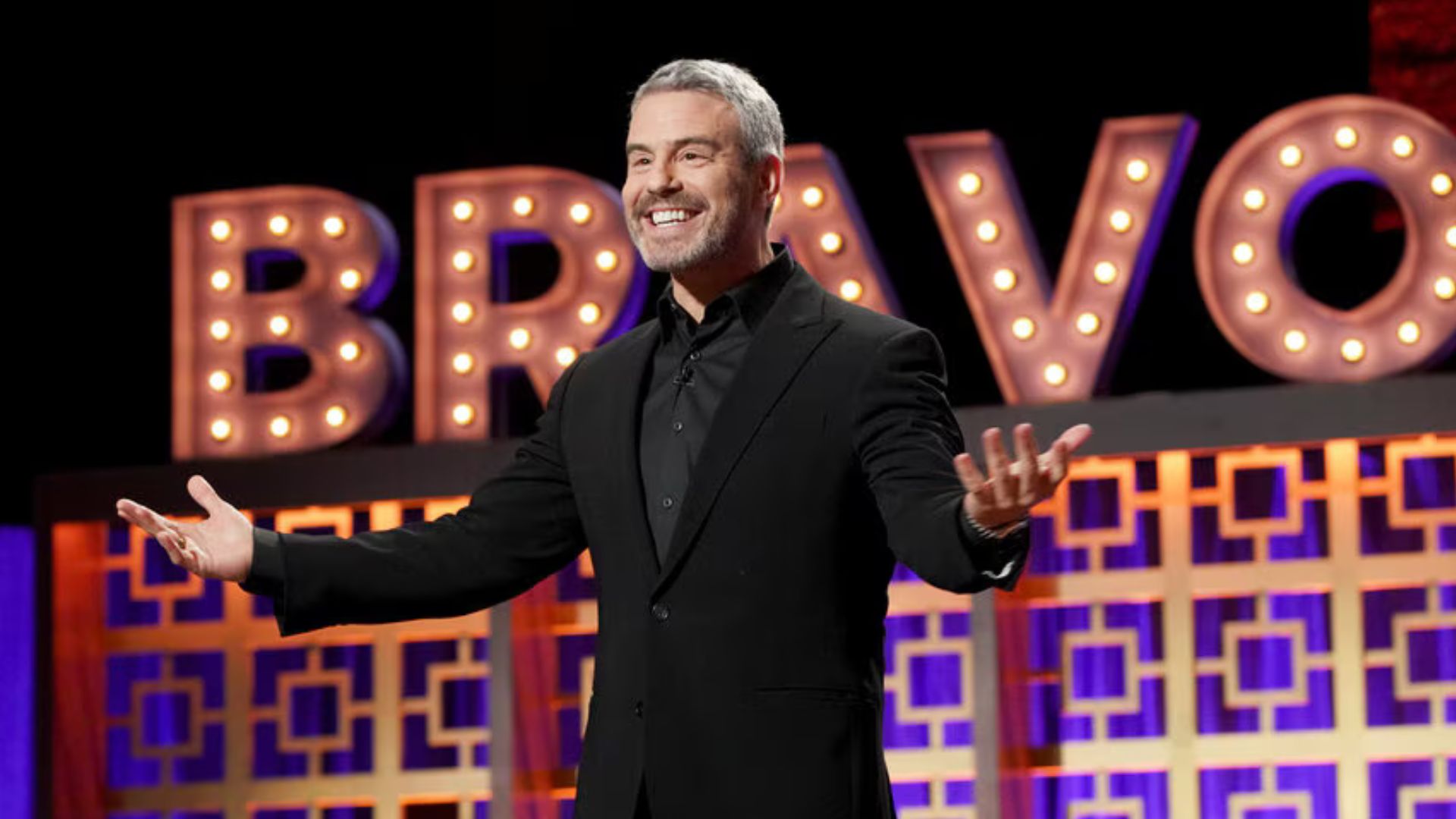 Andy Cohen on the BravoCon stage