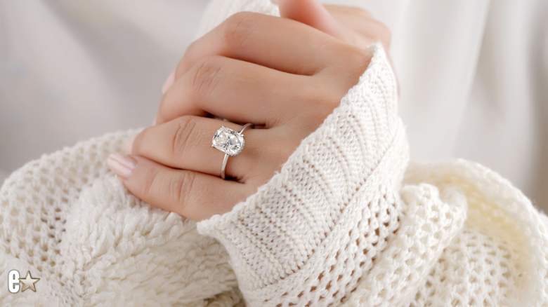 A woman wearing a ring.