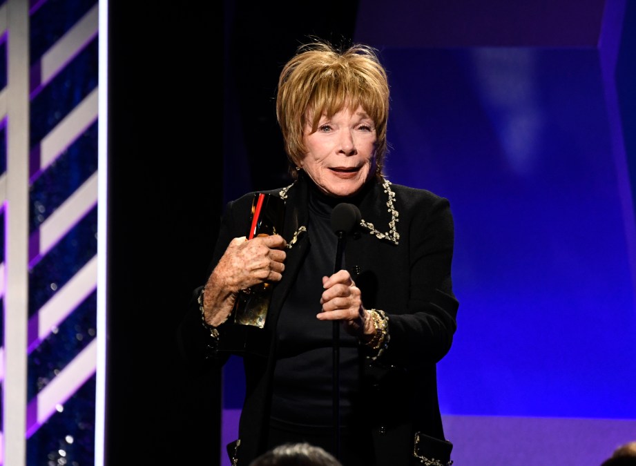 Shirley MacLaine speaks onstage 