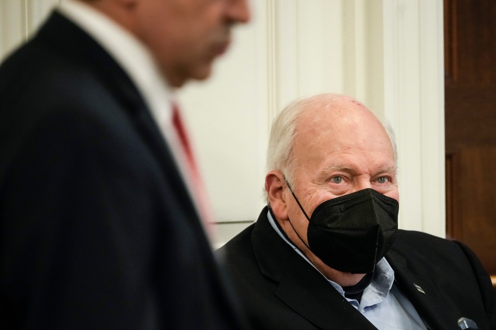 Dick Cheney sitting.