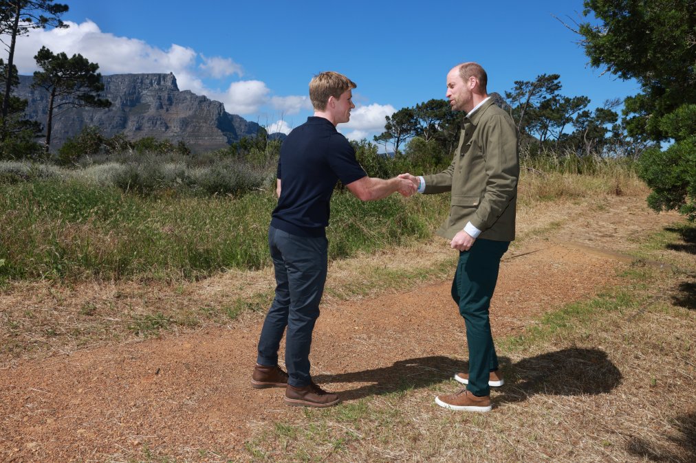 Prince William, Prince of Wales talks to Robert Irwin