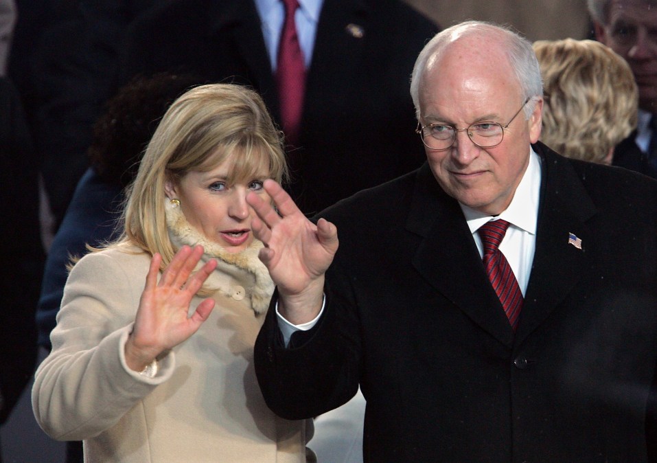 Dick Cheney and his daughter Liz waving at a parade