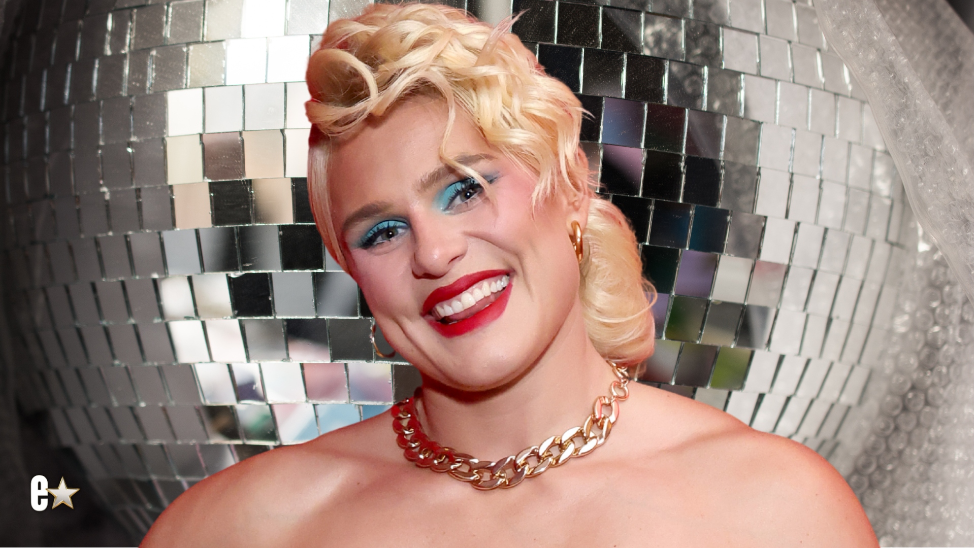 Ilona Maher smiles for photos with blonde hair