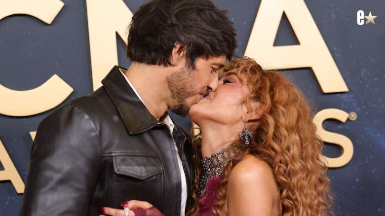 Morgan Evans kisses Laci Kaye Booth