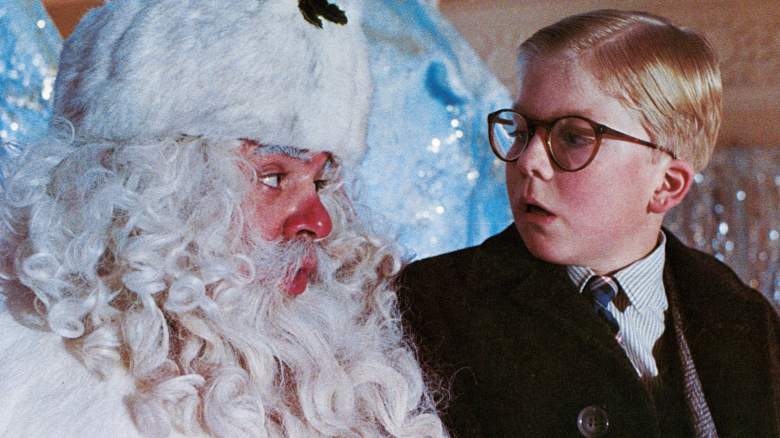 Peter Billingsley sits on Santa's lap in a scene from the film 'A Christmas Story', 1983.