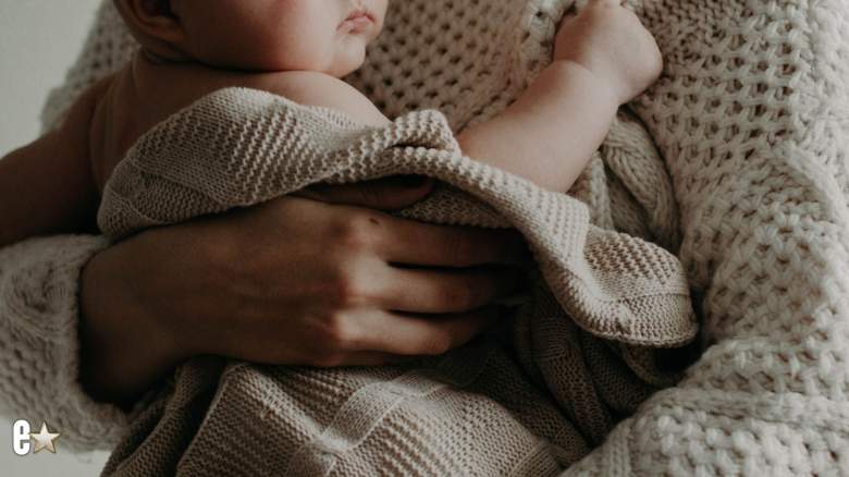 Mother holding her baby