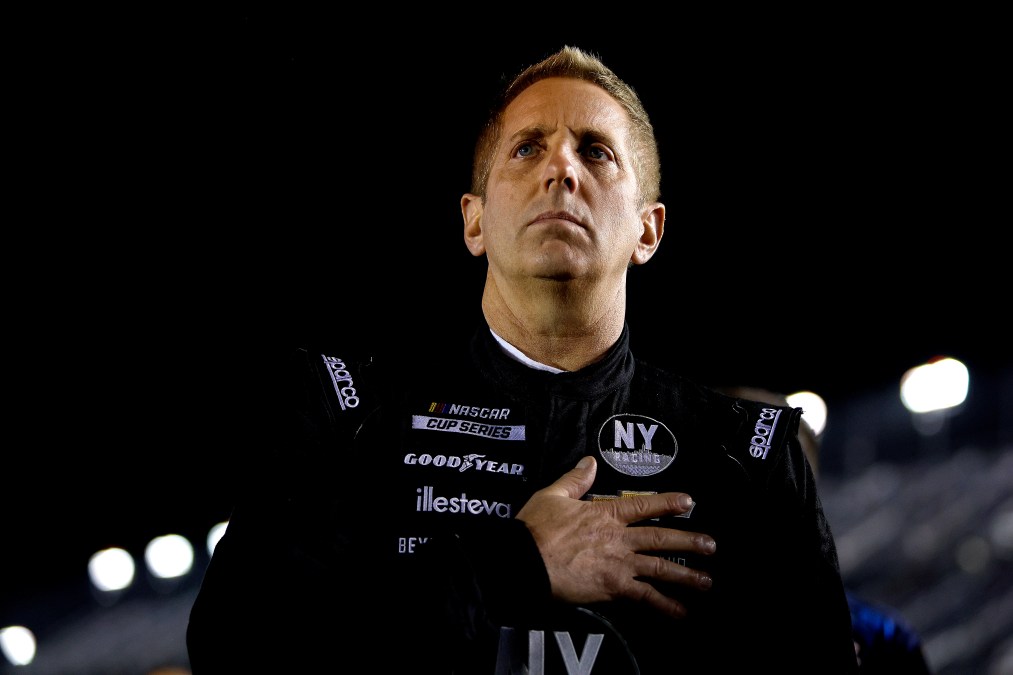 Greg Biffle holding hand over heart