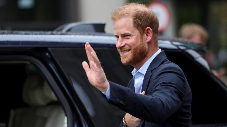Prince Harry, Duke of Sussex waves as he departs following a visit to the Centre for Blast Injury Studies at Imperial College London