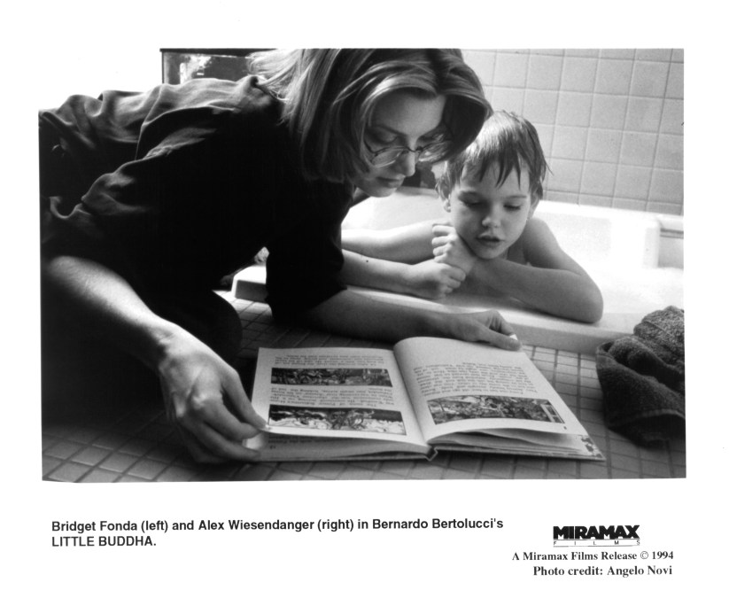 CIRCA 1993: Actress Bridget Fonda and actor Alex Wiesendanger on the set of the Miramax Film movie "Little Buddha" circa 1993. 