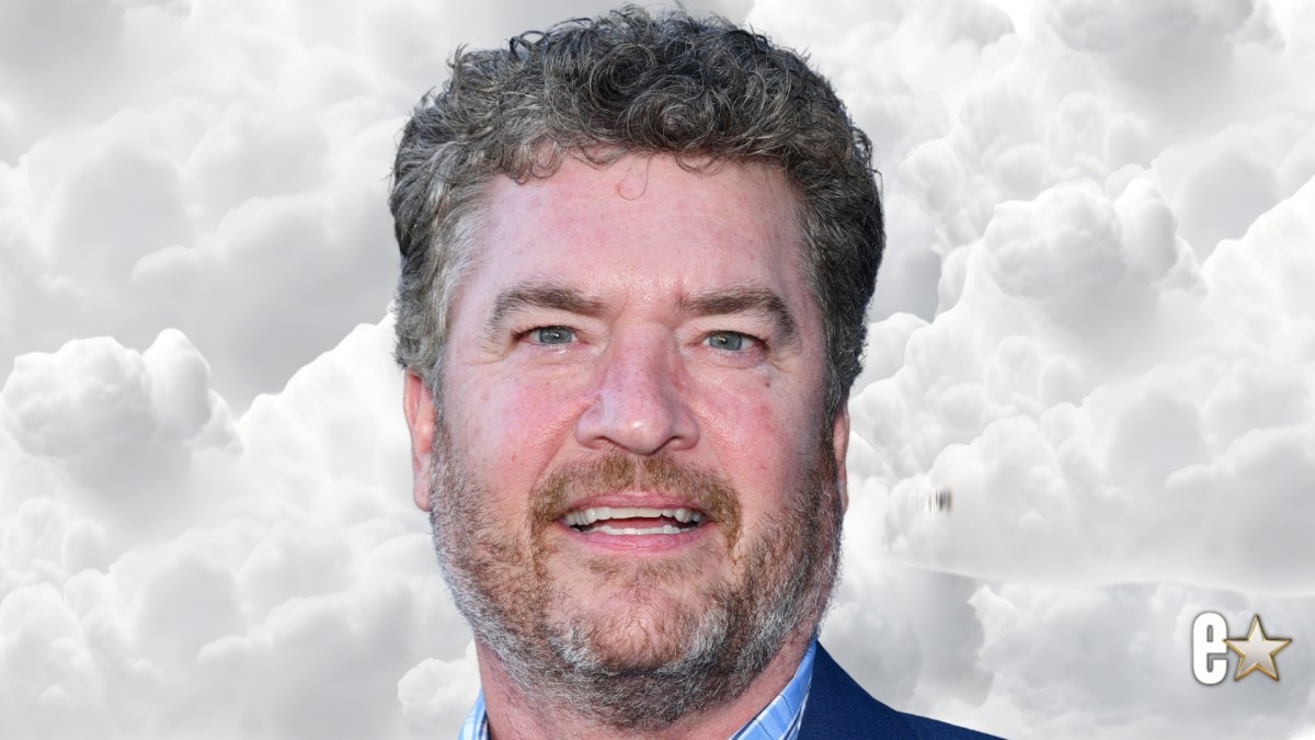 Pat Finn poses for photo at an event
