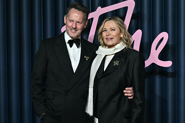 Canadian actress Kim Cattrall (R) and boyfriend Russell Thomas
