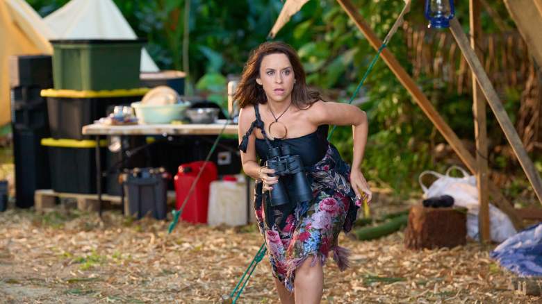 Lacey Chabert with binoculars on beach