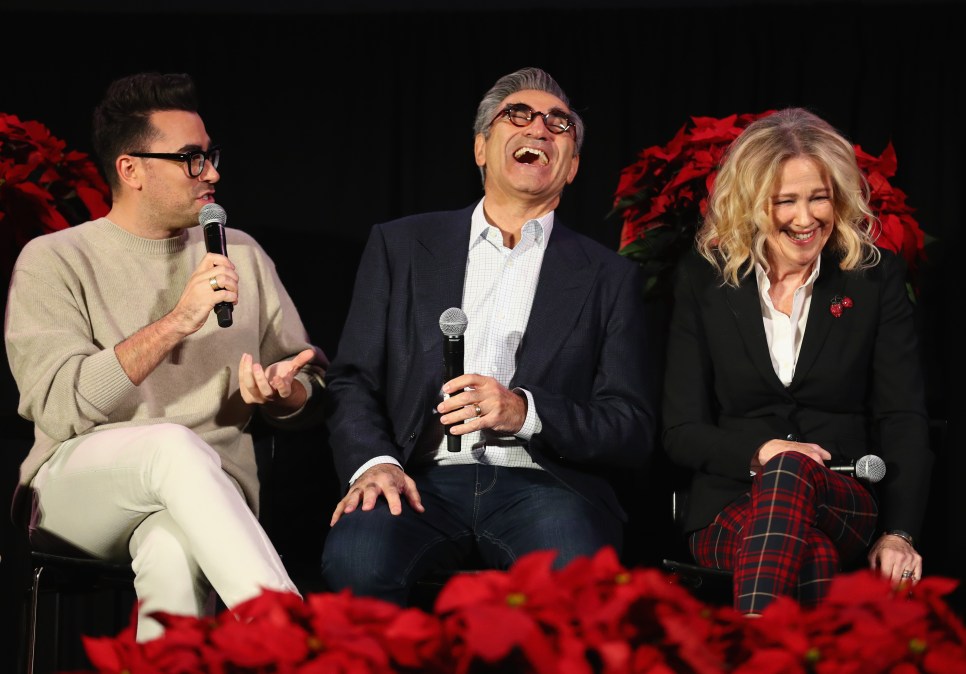 Eugene Levy, Daniel Levy and Catherine O'Hara laughing