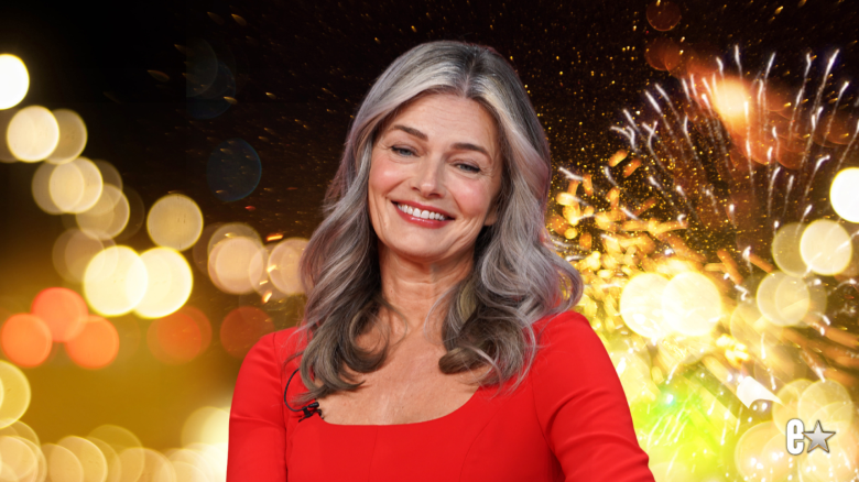 Paulina Porizkova smiling in red dress