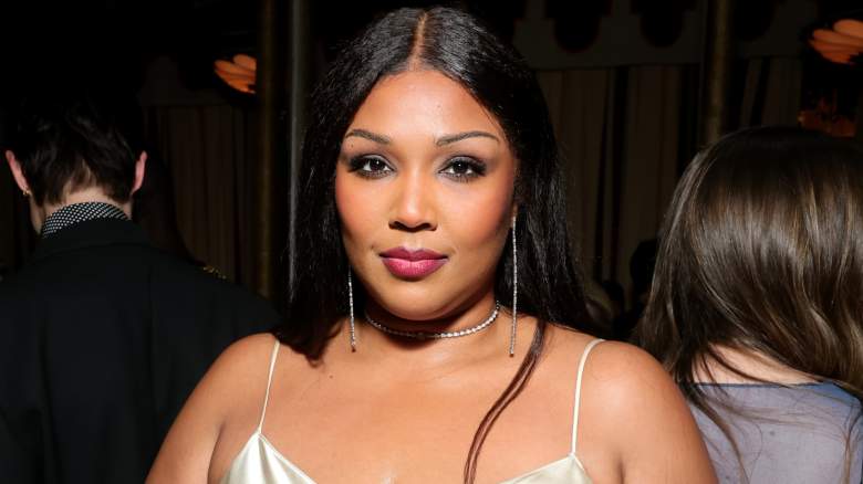 Lizzo poses for photos at an event