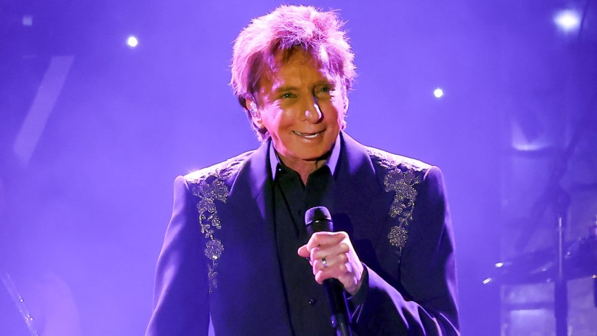 Barry Manilow performing onstage at the Grammys