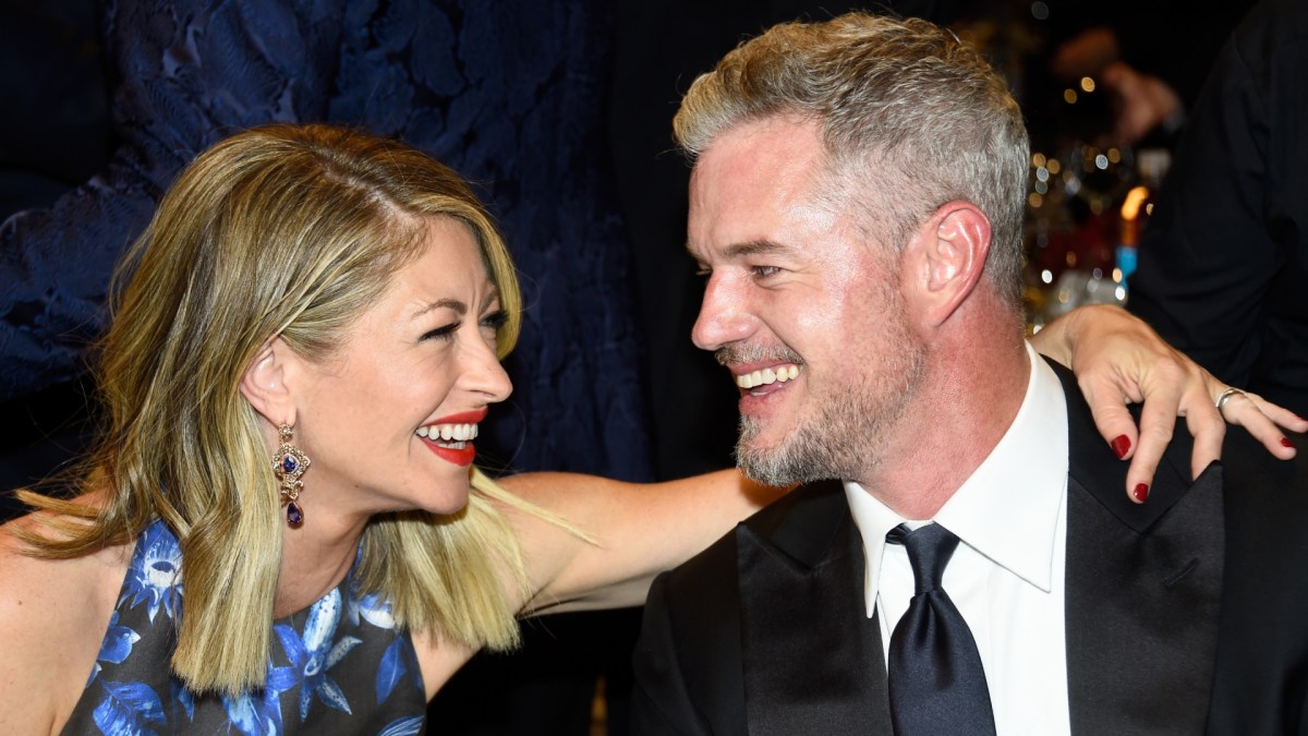 Rebecca Gayheart and Eric Dane smiling at an event