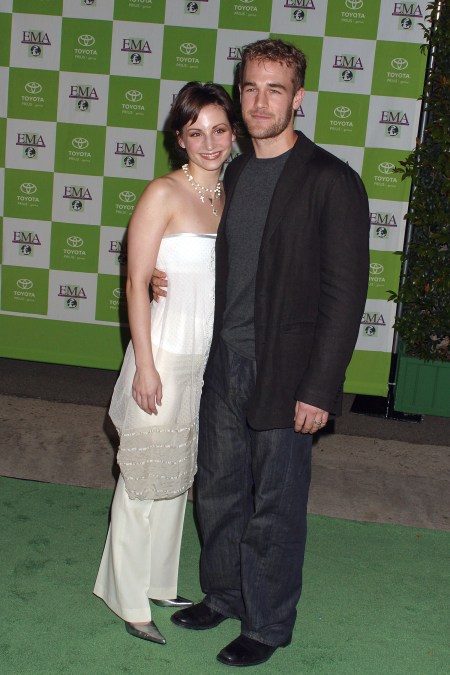 Heather McComb and James Van Der Beek posing for photos