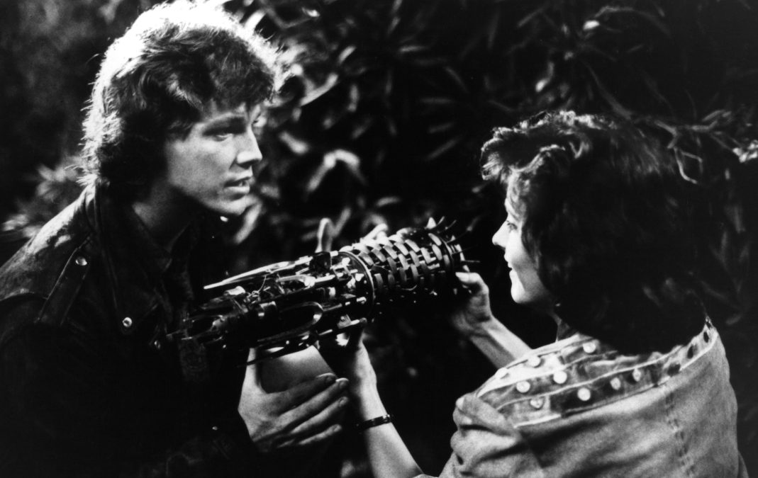 Robert Duncan McNeill (L) with Courteney Cox in "Masters of the Universe" (1987).