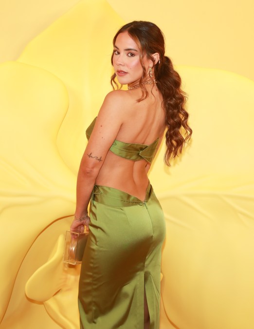 Gabriela Berlingeri  poses for photos at an event