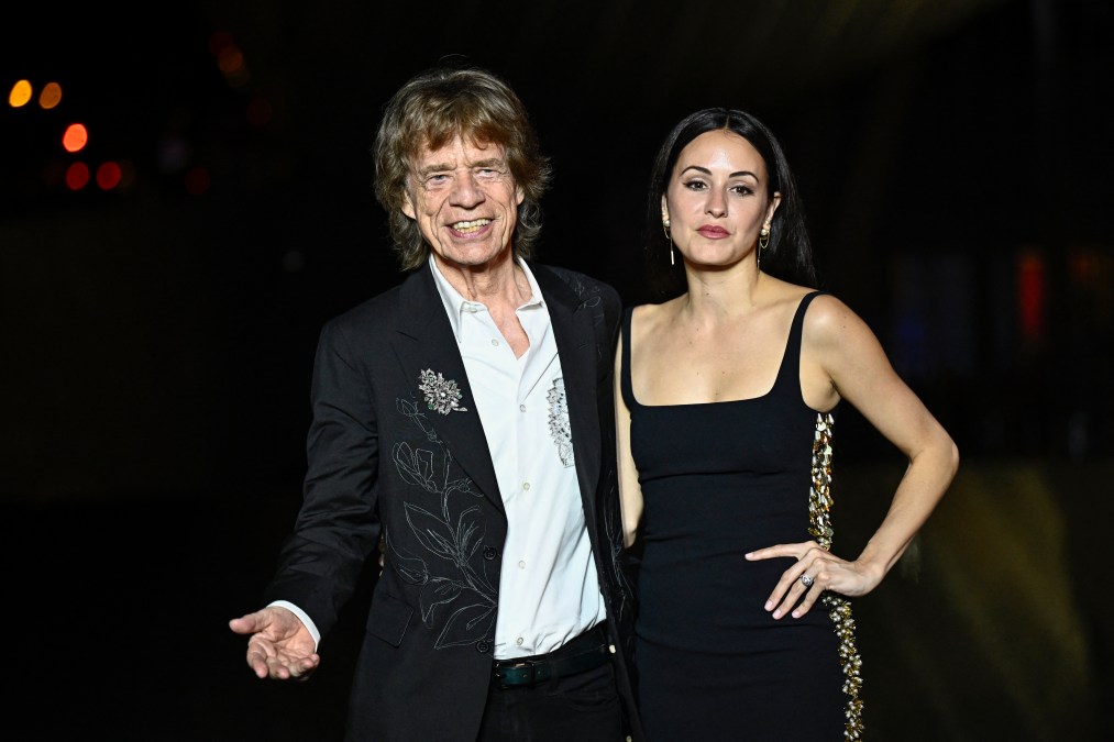 British singer Sir Mick Jagger (L) and his partner US choreographer Melanie Hamrick