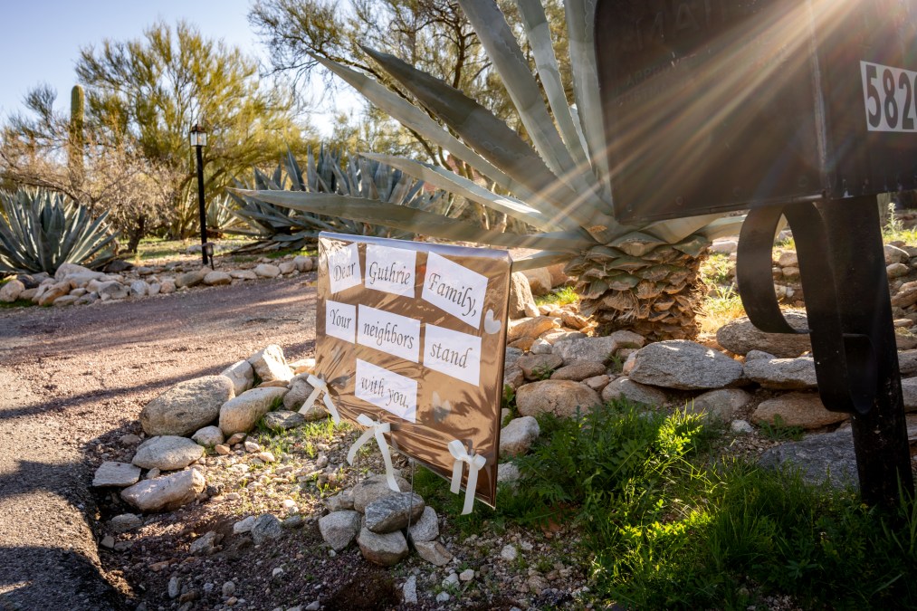 A sign is posted at the house of Nancy Guthrie,