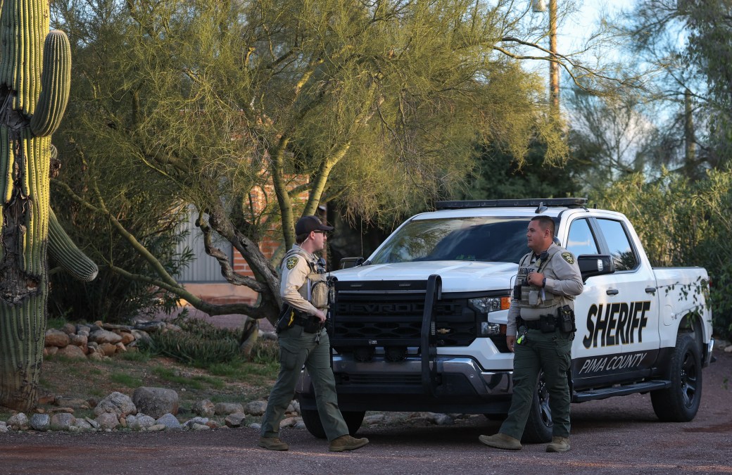 Pima County Sheriff's deputies are seen in front of Nancy Guthrie's residence