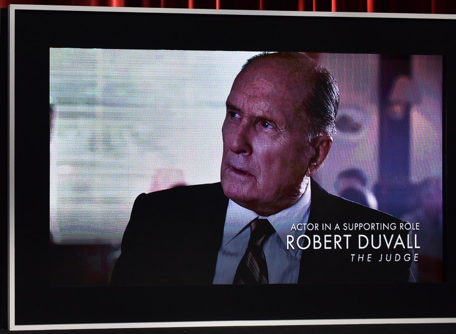An image is displayed on a big screen onstage of Best Actor in a Supporting Role nominee Robert Duvall 