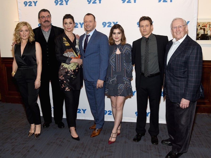 Cast of "Blue Bloods" pose for a photo at an event
