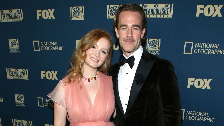 James Van Der Beek and Kimberly Van Der Beek pose for a photo