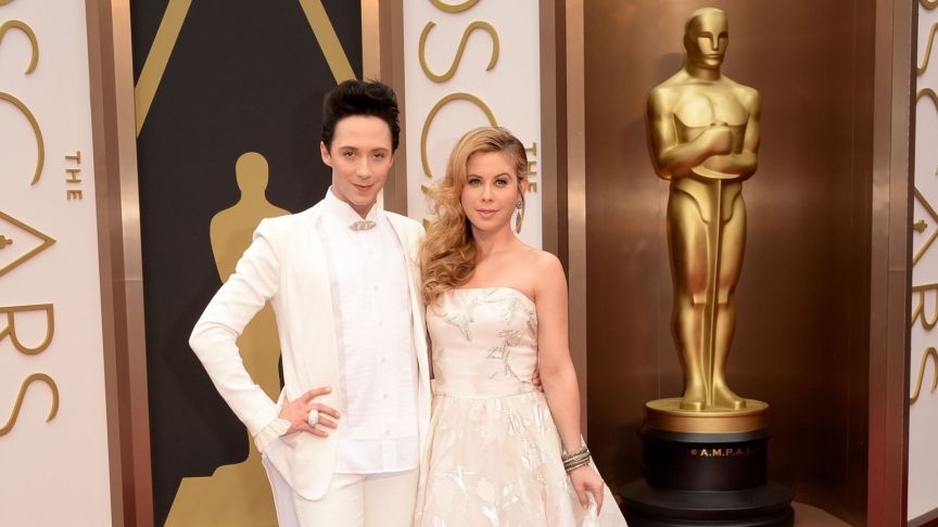 TV Personalities Johnny Weir (L) and Tara Lipinski attend the Oscars held at Hollywood & Highland Center on March 2, 2014 in Hollywood, California