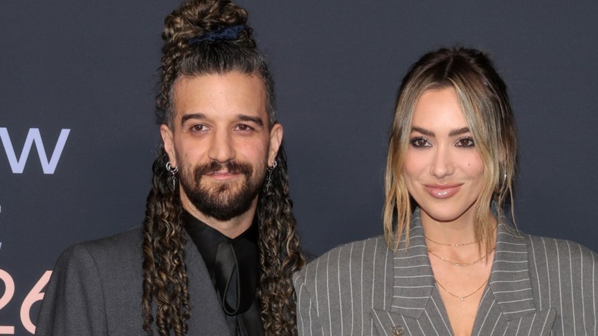 Mark Ballas and his wife BC Jean smile at an event