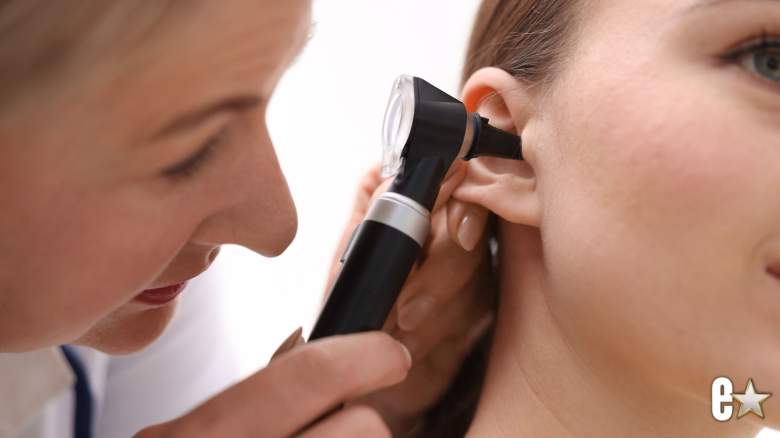 young woman having an ear examination