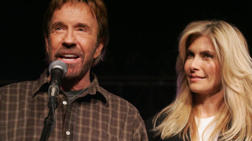 Chuck Norris and his wife, Gena O'Kelley, speak during a "Huck and Chuck" rally for Republican Presidential hopeful and former Arkansas Governor Mike Huckabee at the Val Air Ballroom in Des Moines, Iowa, 01 January 2008
