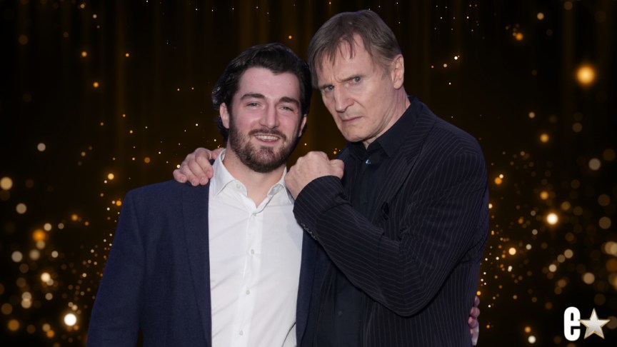 Daniel Neeson and Liam Neeson pose for photos at a film event