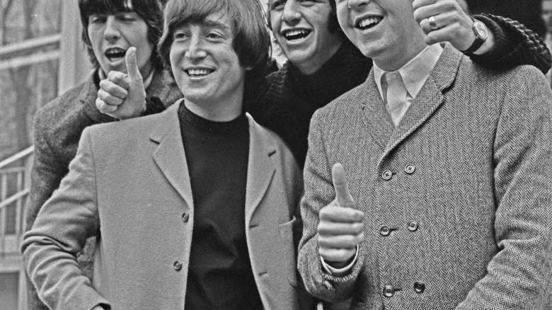The Beatles pose outside Abbey Road Studios