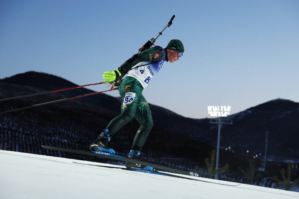 Linas Banys of Team Lithuania skis during Biathlon competition