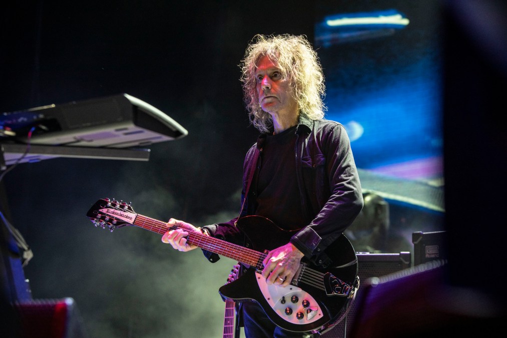 Perry Bamonte of The Cure performing onstage