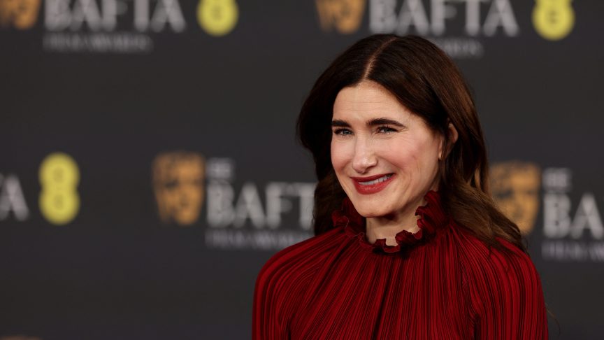 Kathryn Hahn poses on the red carpet upon arrival at the BAFTA British Academy Film Awards with an outfit that now looks like a clue.
