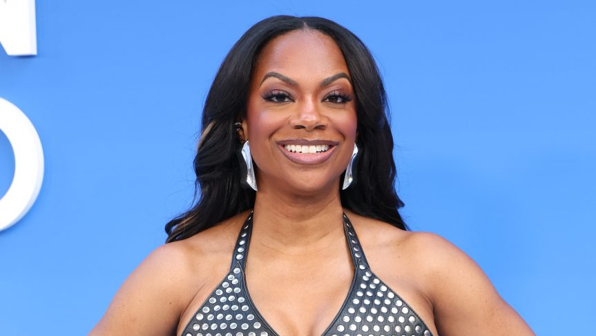 Kandi Burruss at event amid divorce settlement news