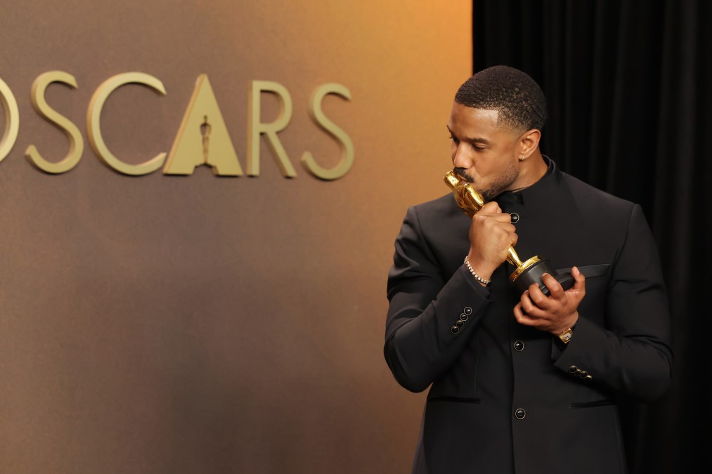 Michael B. Jordan with his Best Actor Oscar for "Sinners."