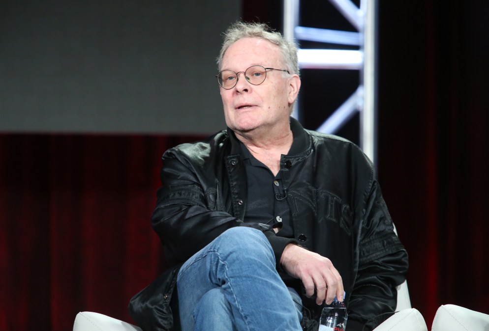 Eric Overmyer onstage during a panel discussion