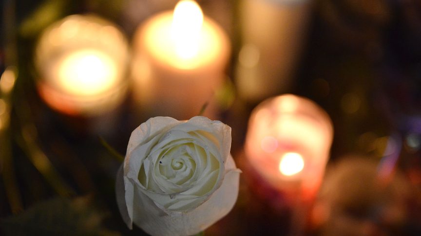 Candles and flowers for Daniel Moody.