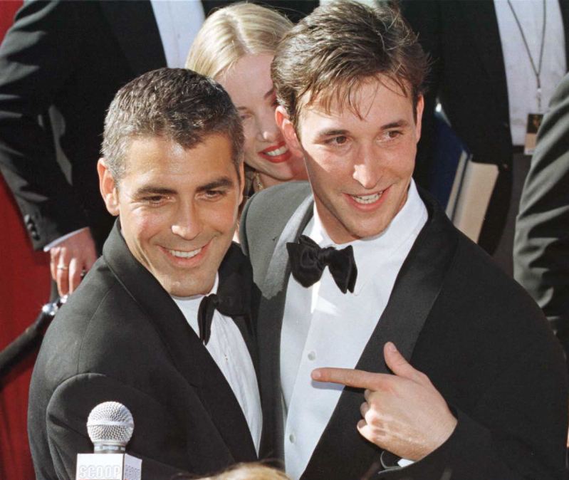 Noah Wyle (R) and George Clooney (L), arrive for the 48th Annual Emmy Awards.